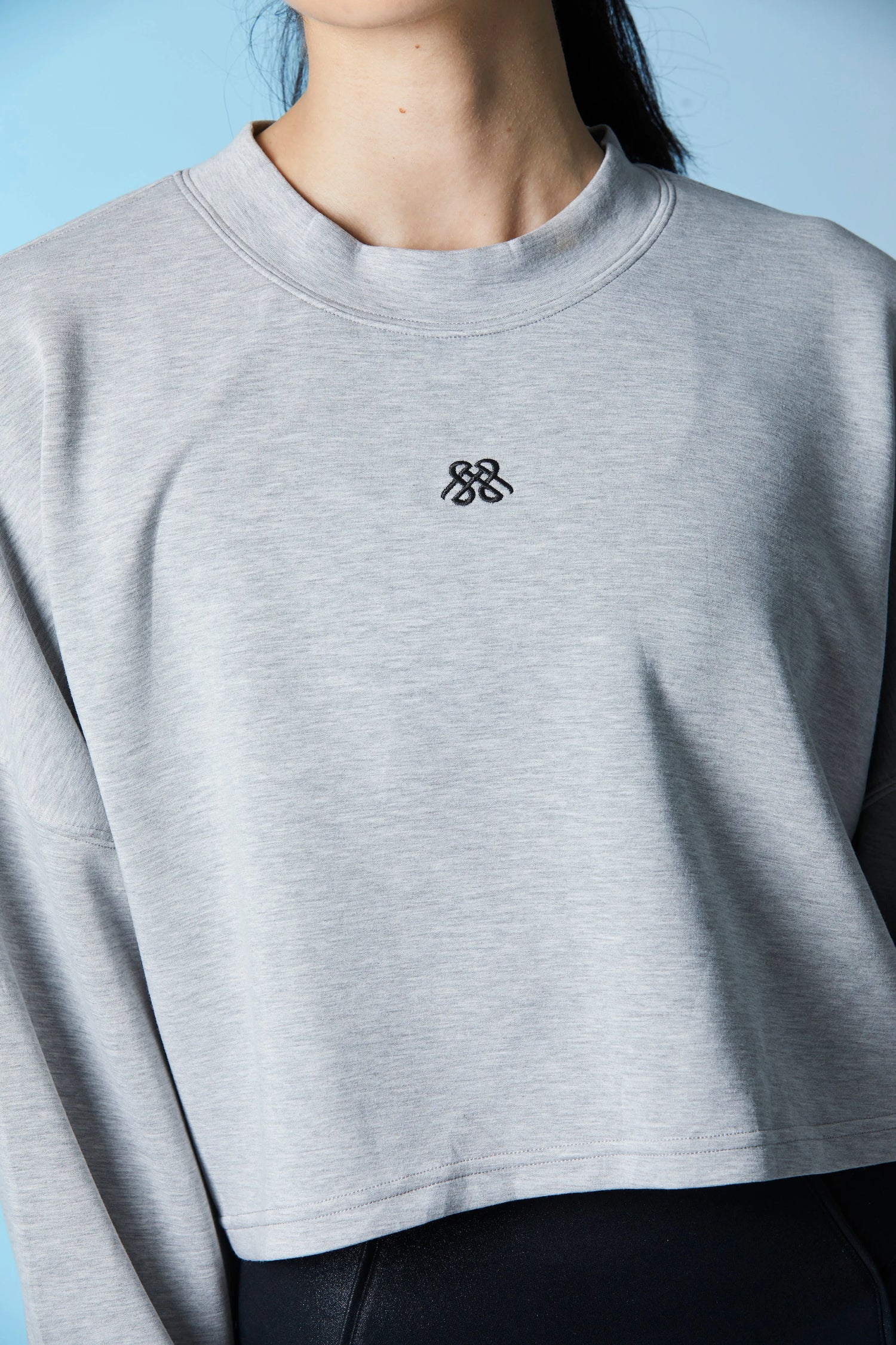 Poleron Gris Marble Cropped Logo